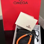 دستبند نارنجی OMEGA