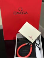 دستبند قرمز OMEGA - تصویر 3